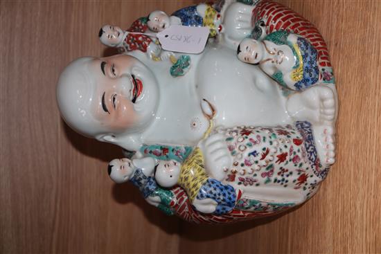 A large Chinese famille rose figure of Budai H.28cm